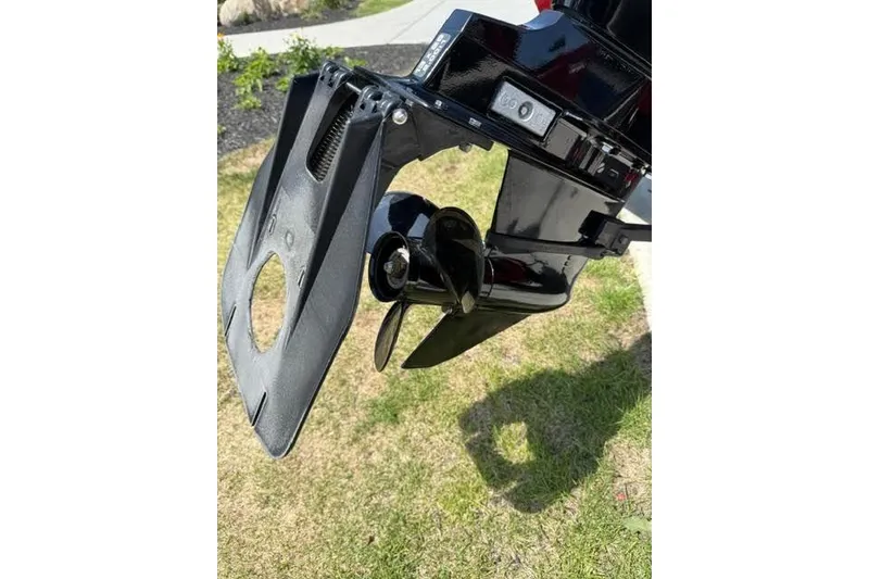 Slide: The Image of Close-up of a 2021 Tracker Super Guide V-16 T boat motor propeller. - 7