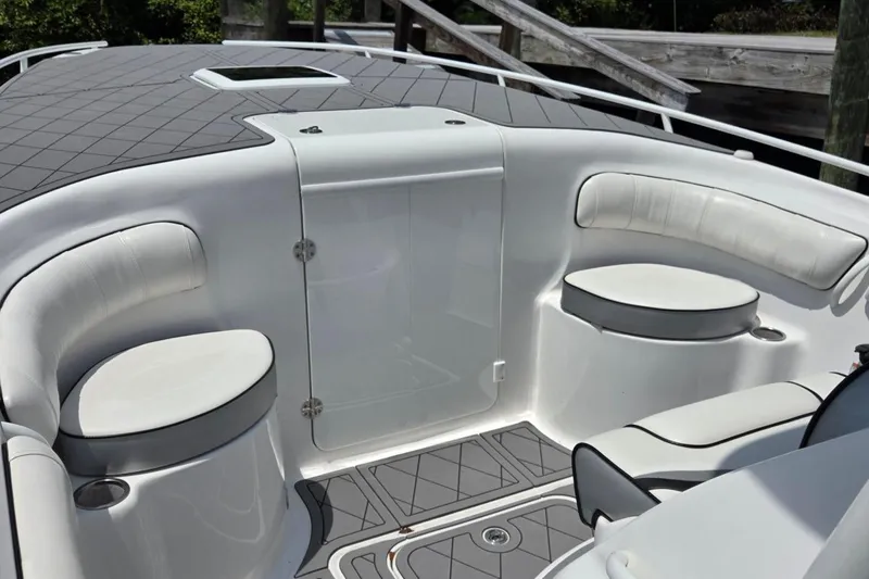 Slide: The Image of 2019 Glasstream 328 SCX boat interior with white seating and sleek design. - 11