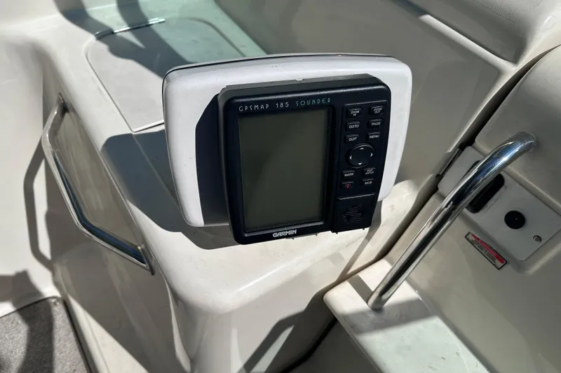 Slide: The Image of Garmin GPSMAP 185 Sounder on 1998 Sea Ray 260 Signature boat dashboard. - 11