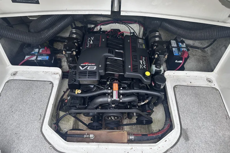 Slide: The Image of Engine compartment of a 1998 Sea Ray 260 Signature with MerCruiser V8 engine. - 24