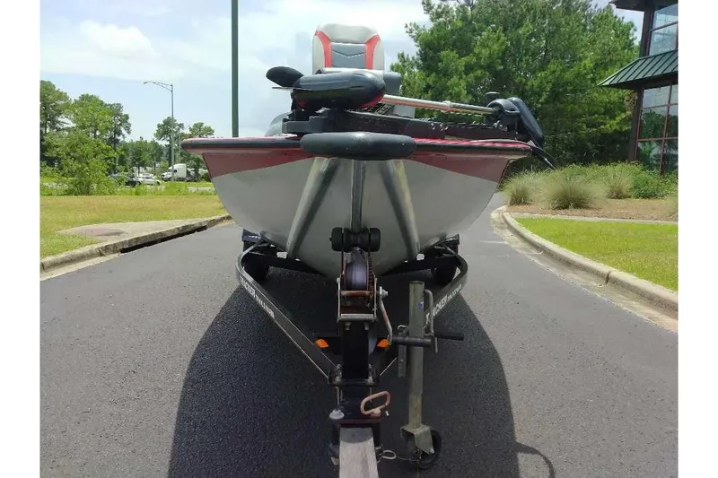 Slide: The Image of 2009 Tracker Pro Team 175 TXW boat on trailer, parked on a road. - 12