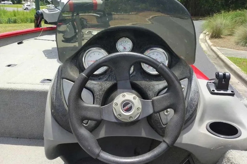 Slide: The Image of Steering console of 2009 Tracker Pro Team 175 TXW boat with gauges and controls. - 3