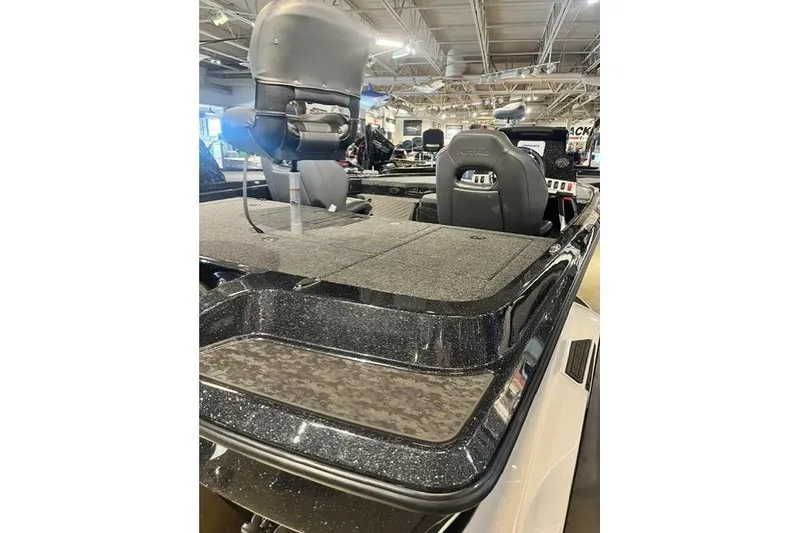 Slide: The Image of 2026 Nitro Z19 XL boat interior with seating and deck, displayed indoors. - 3