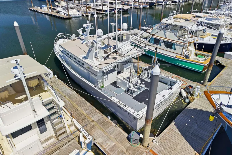 Slide: The Image of Aerial view of Dixon 55 yacht docked at marina, 2018 model. - 4