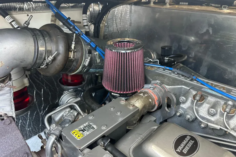 Slide: The Image of Engine compartment of a 2006 Cruisers Yachts 370 Express with Yanmar diesel engine. - 48