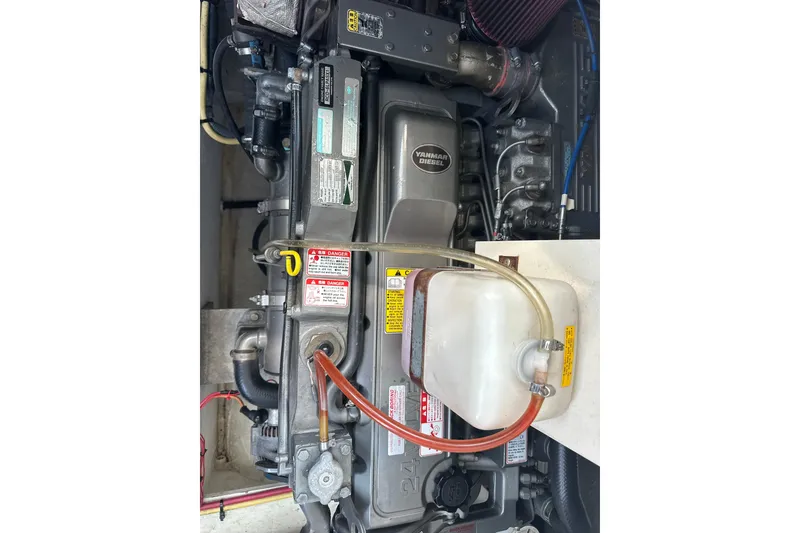 Slide: The Image of Engine of a 2006 Cruisers Yachts 370 Express with Yanmar Diesel components. - 46