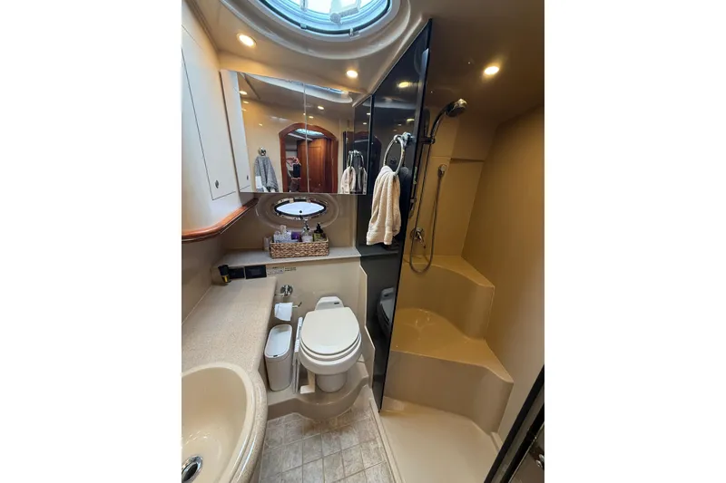 Slide: The Image of Luxurious bathroom in 2006 Cruisers Yachts 370 Express with shower and modern amenities. - 37