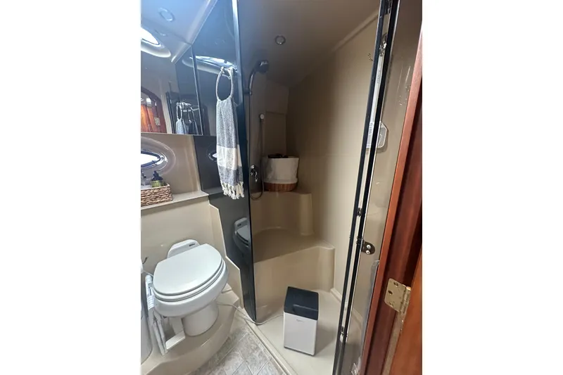 Slide: The Image of Bathroom interior of 2006 Cruisers Yachts 370 Express with shower and toilet. - 41