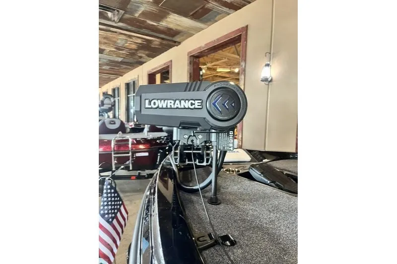 Slide: The Image of 2026 Ranger Z518 Cup-Equipped boat with Lowrance sonar system displayed indoors. - 9
