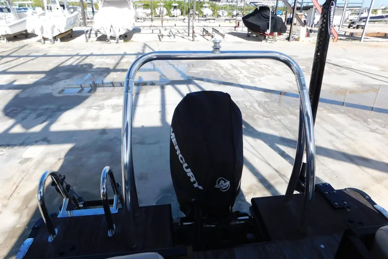 Slide: The Image of 2023 Viaggio Diamante U 26 boat with Mercury engine cover, docked in a marina. - 36
