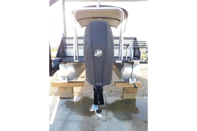 Slide: The Image of 2023 Viaggio Diamante U 26 pontoon boat with covered outboard motor. - 7