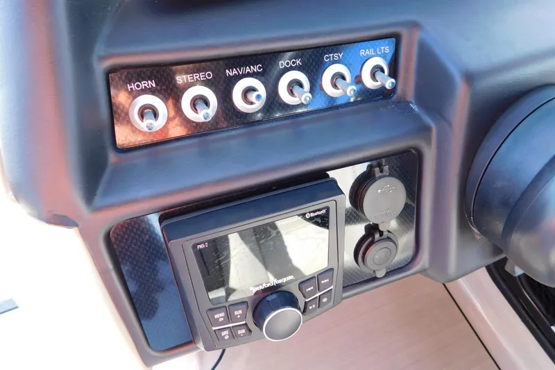 Slide: The Image of Control panel of 2023 Viaggio Diamante U 26 boat with switches and audio system. - 25