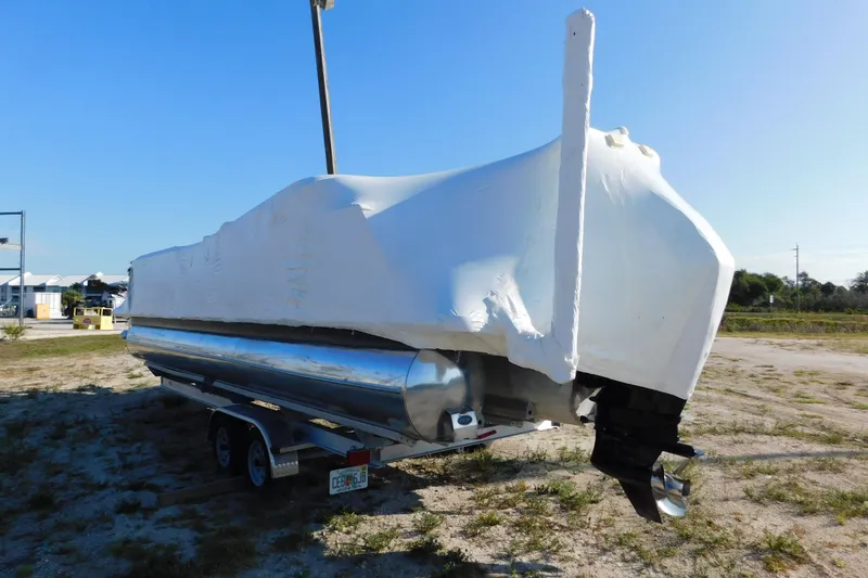 Slide: The Image of 2023 Viaggio Diamante U 26 boat covered in protective wrap on a trailer. - 4