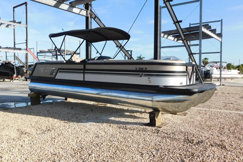 The Image of 2023 Viaggio Diamante U 26 pontoon boat on dry dock, sunny day. - 1