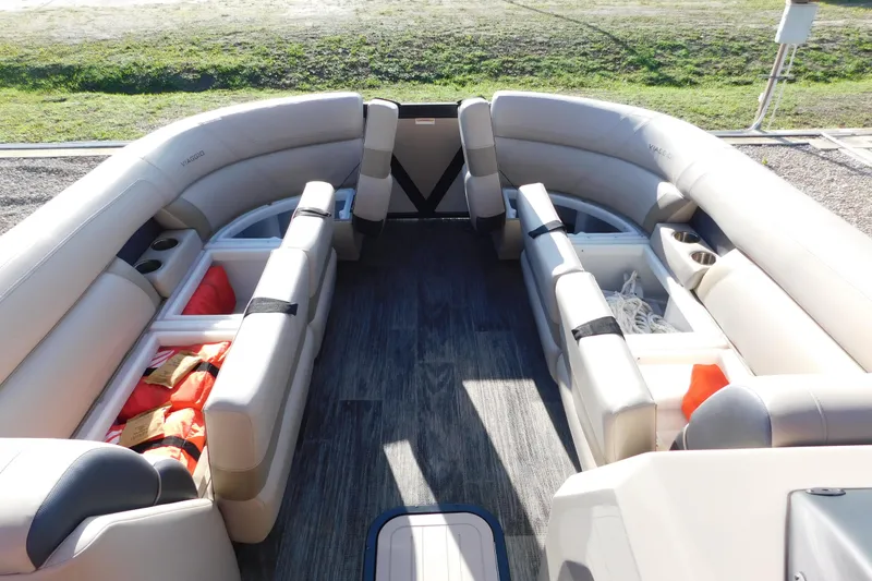 Slide: The Image of 2023 Viaggio Diamante U 26 boat interior with beige seating and storage compartments. - 30