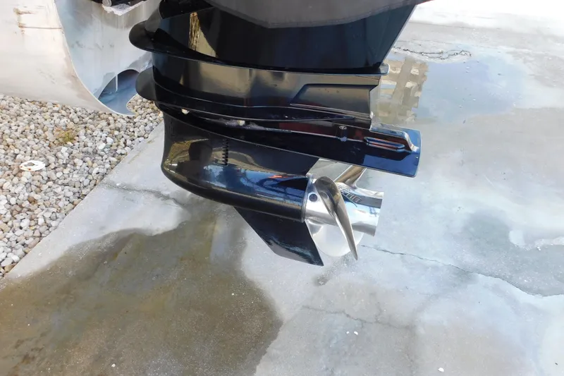 Slide: The Image of Close-up of a 2023 Viaggio Diamante U 26 boat propeller on a wet surface. - 14