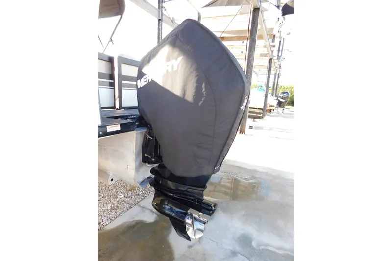 Slide: The Image of Covered outboard motor on a 2023 Viaggio Diamante U 26 boat. - 10