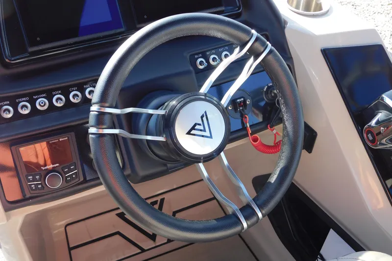 Slide: The Image of Steering wheel of 2023 Viaggio Diamante U 26 boat with control panel and switches. - 20
