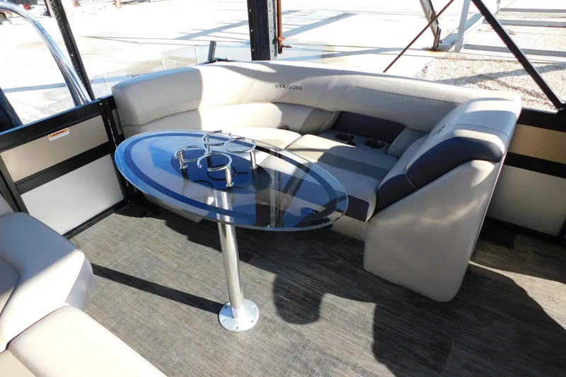 Slide: The Image of Luxurious seating area on 2023 Viaggio Diamante U 26 boat with sleek table design. - 27