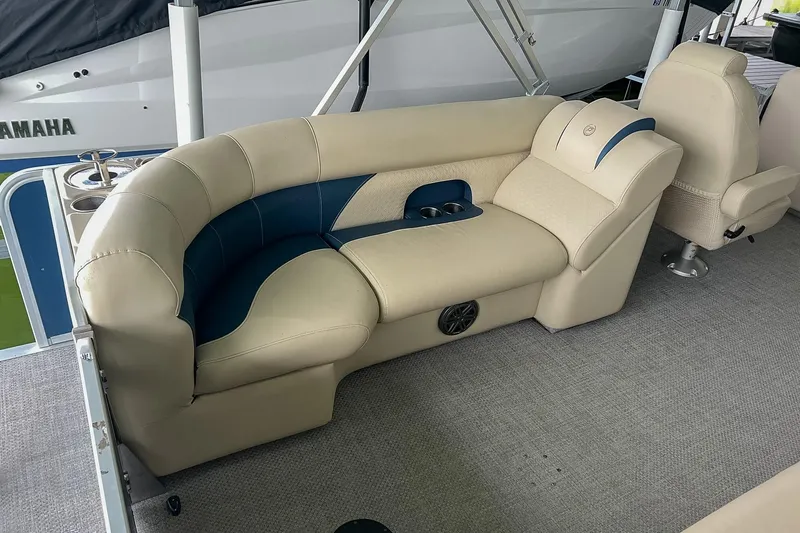 Slide: The Image of Luxurious seating on 2020 Premier 230 Sunsation pontoon boat with beige upholstery. - 27