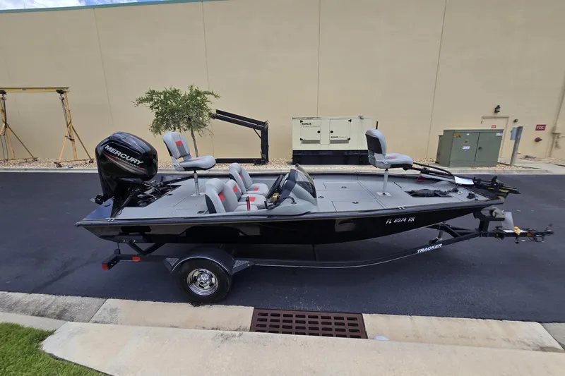 Slide: The Image of 2017 Tracker Pro Team 175 TXW fishing boat with Mercury engine on trailer. - 3