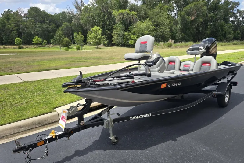 Slide: The Image of 2017 Tracker Pro Team 175 TXW fishing boat on trailer, parked outdoors. - 7
