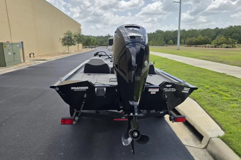 Slide: The Image of 2017 Tracker Pro Team 175 TXW boat on trailer, rear view, outdoors. - 6