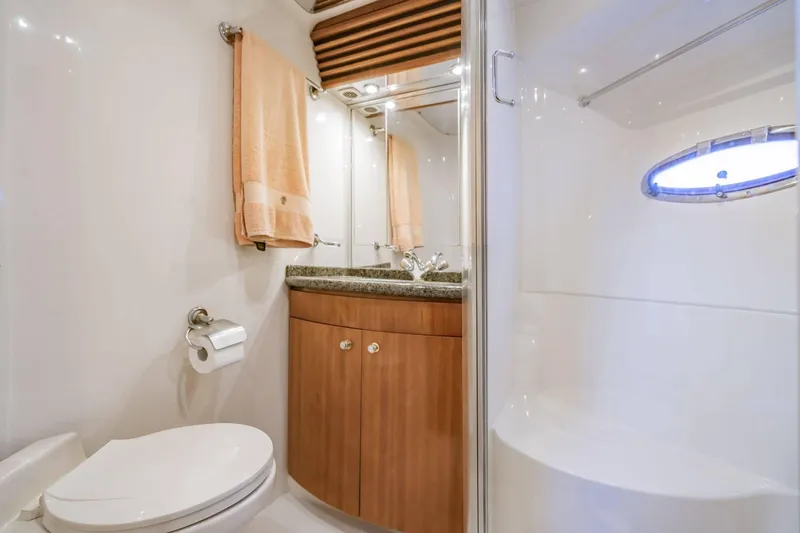 Slide: The Image of Luxurious bathroom in 2000 Carver 450 Voyager Pilothouse yacht with modern fixtures. - 64