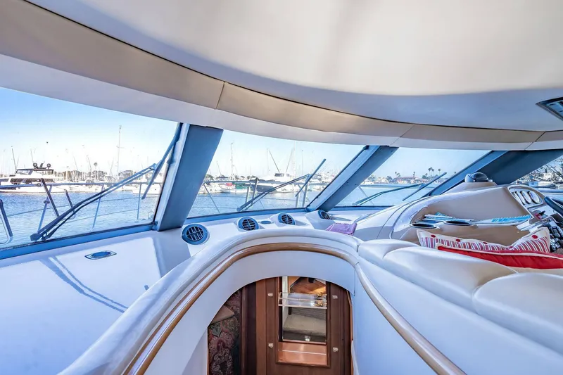 Slide: The Image of Luxurious interior of 2000 Carver 450 Voyager Pilothouse yacht with marina view. - 50