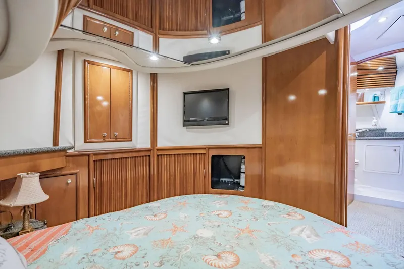 Slide: The Image of Luxurious interior of 2000 Carver 450 Voyager Pilothouse with wood paneling and cozy decor. - 63