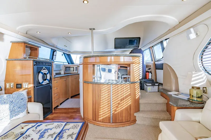 Slide: The Image of Luxurious interior of 2000 Carver 450 Voyager Pilothouse yacht with modern amenities. - 39