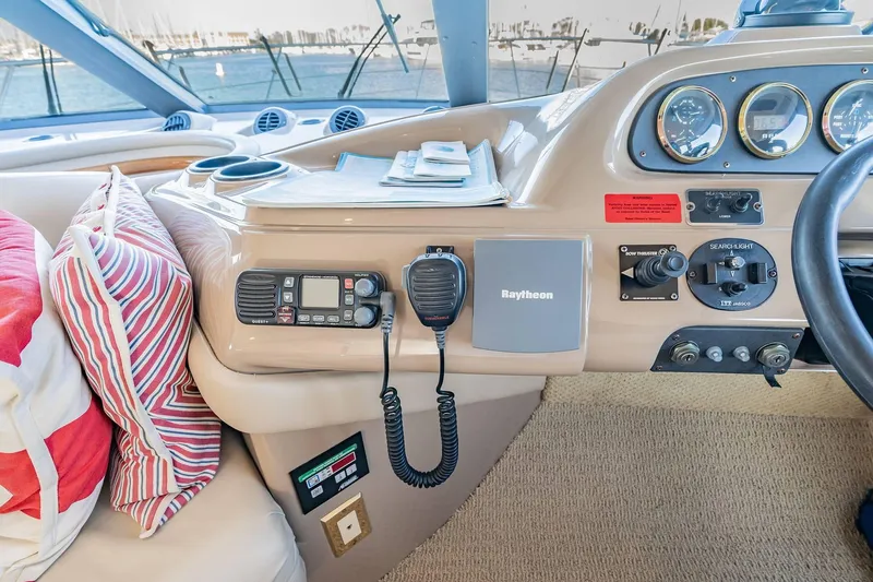 Slide: The Image of Pilothouse interior of 2000 Carver 450 Voyager with navigation equipment and controls. - 46