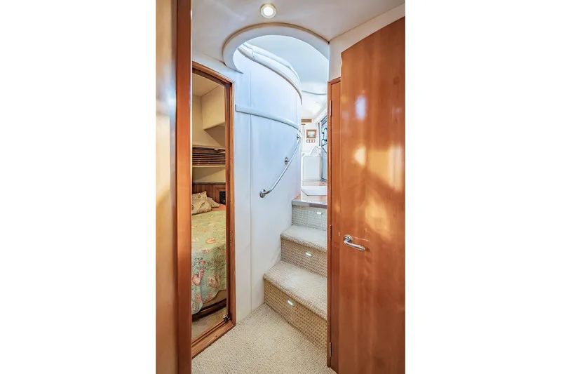 Slide: The Image of Interior of 2000 Carver 450 Voyager Pilothouse with stairs and bedroom view. - 51
