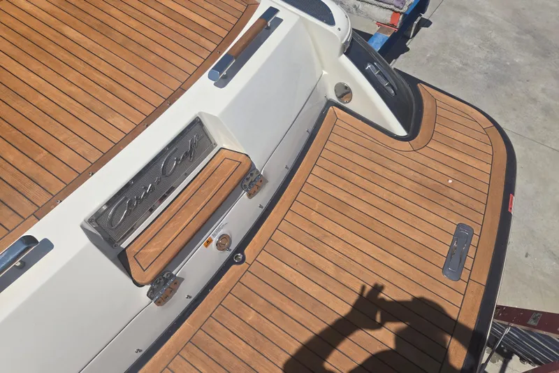 Slide: The Image of 2013 Chris-Craft Corsair 28 boat with teak deck and elegant design details. - 7