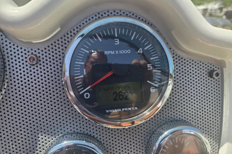 Slide: The Image of Close-up of a 2013 Chris-Craft Corsair 28 tachometer showing 262 engine hours. - 23
