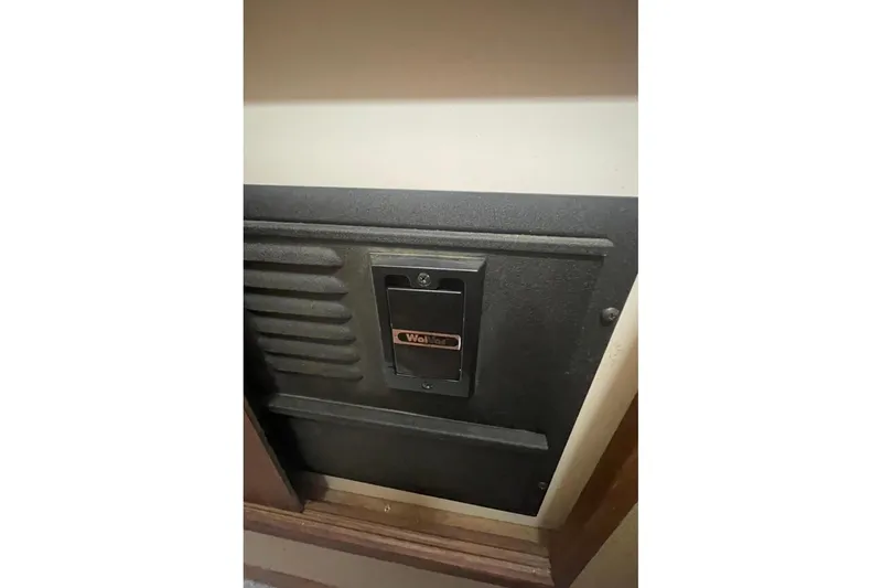 Slide: The Image of Wall-mounted heater control panel on 1988 Bayliner 4588 Pilothouse yacht interior. - 21