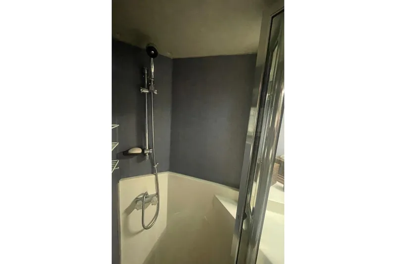Slide: The Image of Shower area in 1988 Bayliner 4588 Pilothouse yacht with modern fixtures. - 17