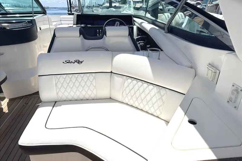 Slide: The Image of Luxurious interior of 2016 Sea Ray SLX 350 boat with white seating and elegant design. - 10