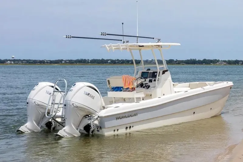 Slide: The Image of Manufacturer Provided Image: 2026 World Cat 235 HB boat with twin Yamaha engines on calm water. - 6