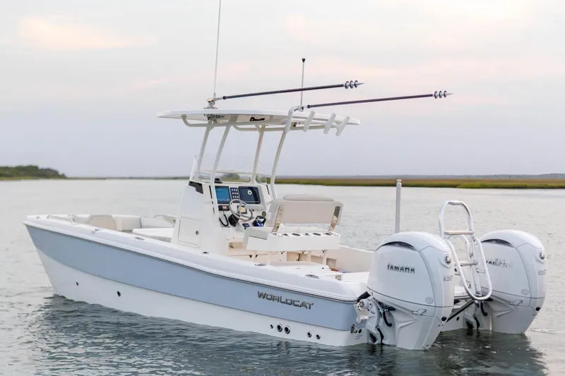 Slide: The Image of Manufacturer Provided Image: 2026 World Cat 235 HB boat with twin Yamaha engines on calm water. - 3