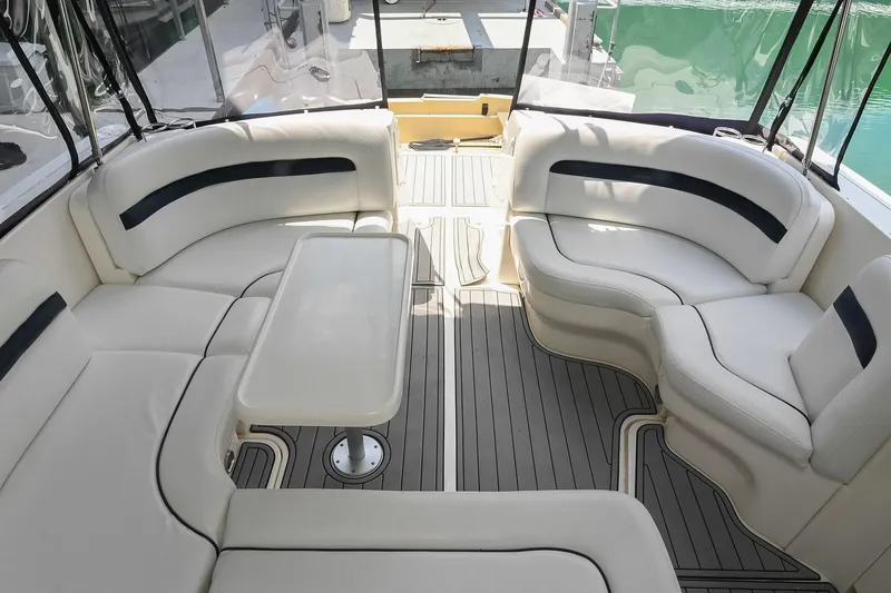 Slide: The Image of Luxurious seating area on a 2008 Sea Ray 38 Sundancer yacht with elegant design. - 7