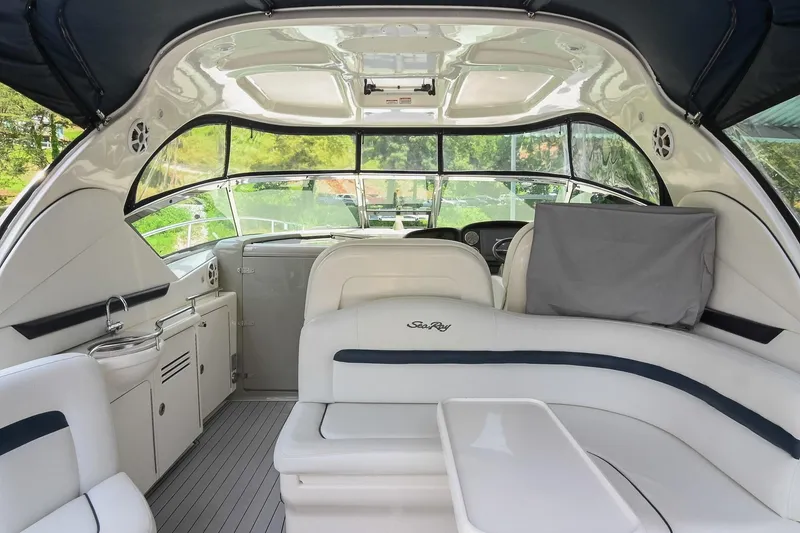 Slide: The Image of Interior of 2008 Sea Ray 38 Sundancer yacht with sleek seating and modern design. - 6