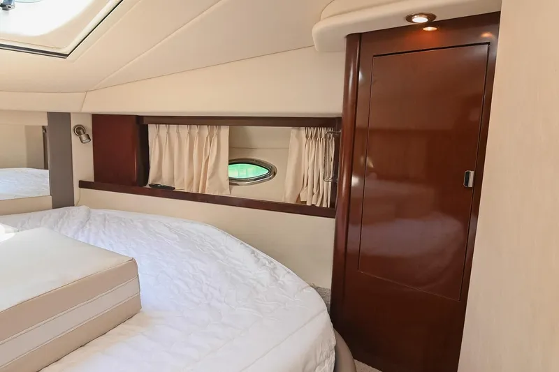 Slide: The Image of Luxurious cabin interior of 2008 Sea Ray 38 Sundancer yacht with elegant wood finishes. - 53