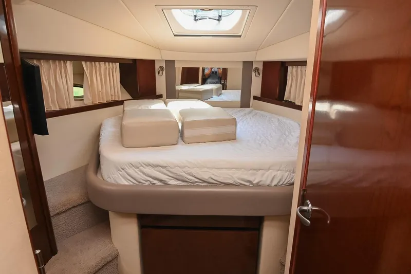 Slide: The Image of Luxurious cabin interior of 2008 Sea Ray 38 Sundancer yacht with plush bedding. - 51