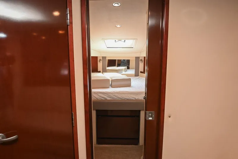 Slide: The Image of Interior cabin view of 2008 Sea Ray 38 Sundancer yacht, featuring a cozy bedroom. - 50