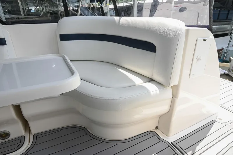 Slide: The Image of White seating area on 2008 Sea Ray 38 Sundancer yacht, featuring sleek design and comfort. - 12