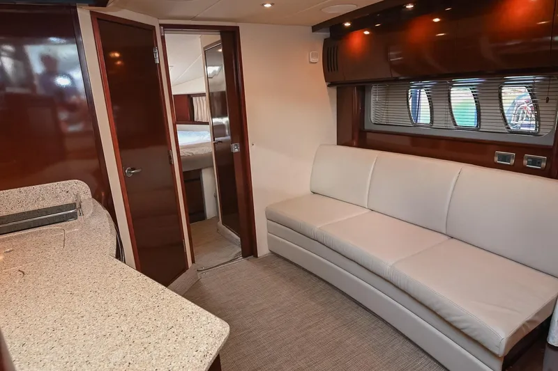 Slide: The Image of Luxurious interior of 2008 Sea Ray 38 Sundancer yacht with elegant seating and modern design. - 45