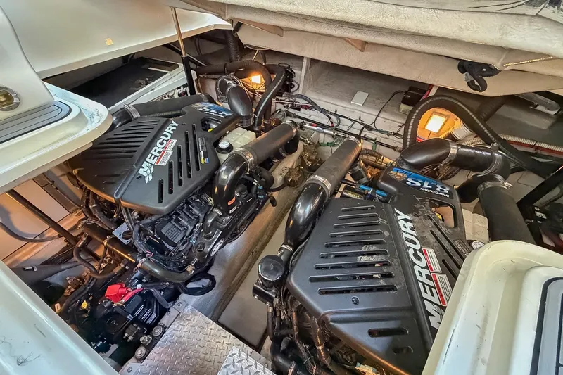 Slide: The Image of Engine room of a 2008 Sea Ray 38 Sundancer with twin Mercury engines. - 59
