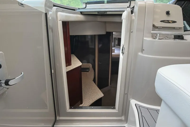 Slide: The Image of 2008 Sea Ray 38 Sundancer cabin entrance with interior view. - 31