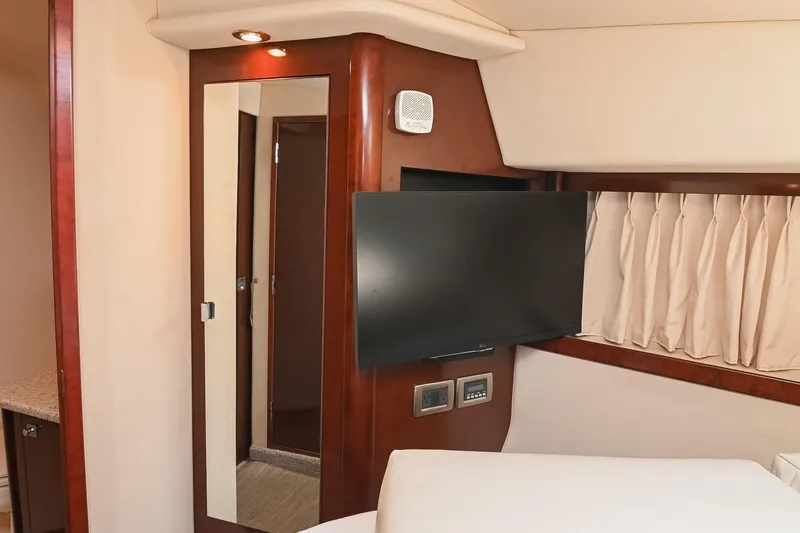 Slide: The Image of Interior of 2008 Sea Ray 38 Sundancer yacht with TV and mirror. - 57
